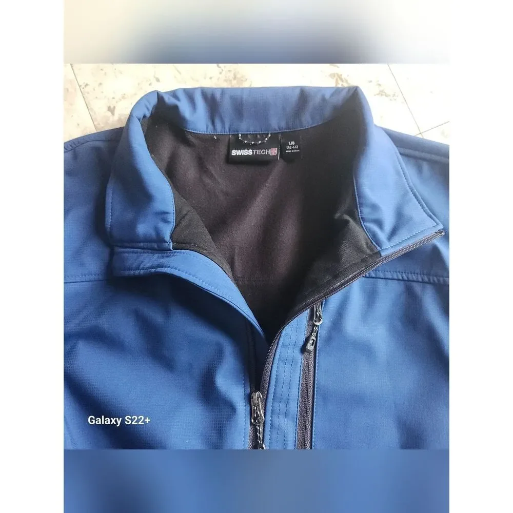O36 Swiss Tech Men's Royal Blue Windbreaker w Zip Closure & Three Front Pockets